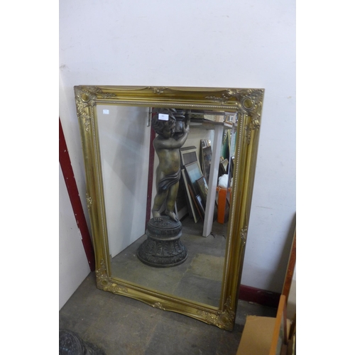 391 - A gilt framed mirror