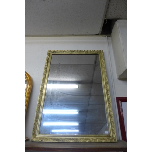 393 - A gilt framed mirror