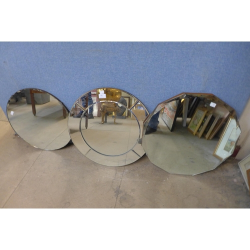 395 - Three circular bevelled edge mirrors