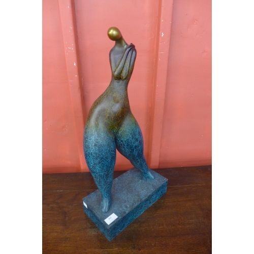 397 - A Surrealist style bronze figure of a lady