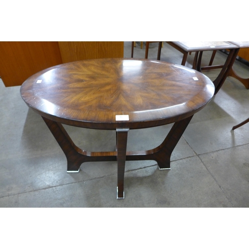 40 - An Art Deco style Vanucci mahogany oval occasional table, designed by Theodore Alexander