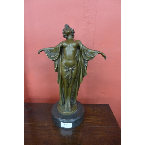 404 - An Art Deco style bronze figure of a semi nude female, on black marble socle