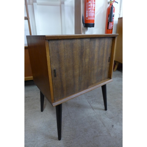 44 - A teak record cabinet