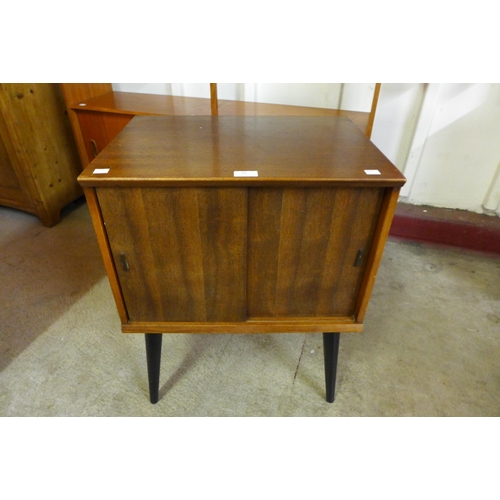 44 - A teak record cabinet