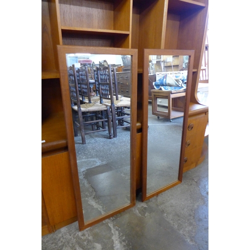 48 - A pair of Danish teak framed mirrors