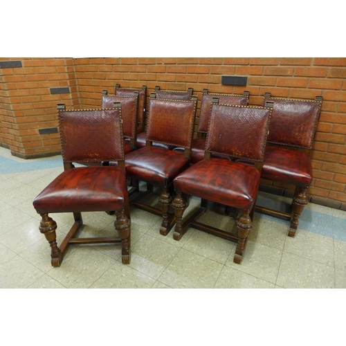 5 - A set of eight 17th Century style carved oak and red leather chairs