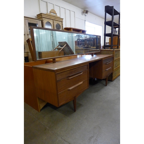 50 - A White & Newton teak dressing table