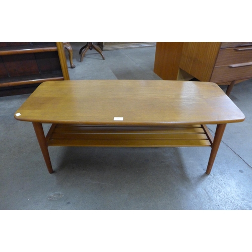 52 - A teak coffee table