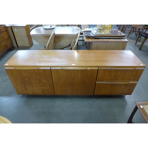 58 - A teak sideboard