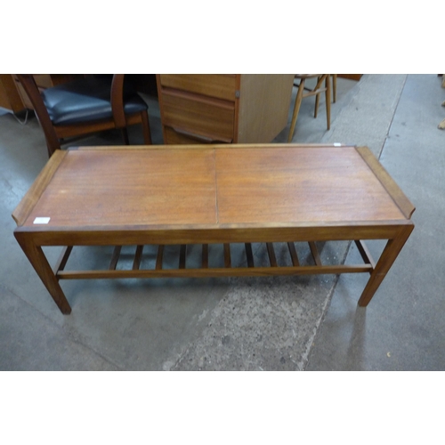 61 - A Remploy teak extending coffee table