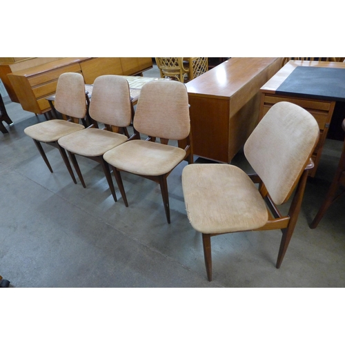 63 - A set of four Elliotts of Newbury teak dining chairs