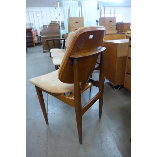 63 - A set of four Elliotts of Newbury teak dining chairs