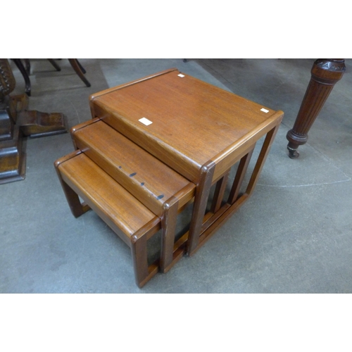 75 - A teak nest of tables