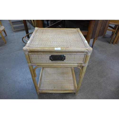 95 - A bamboo and rattan single drawer lamp table