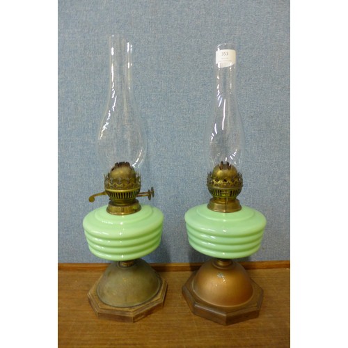 353 - A pair of Victorian brass and celadon coloured glass oil lamps