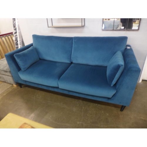 1491 - An Alice blue velvet three seater sofa - damaged leg