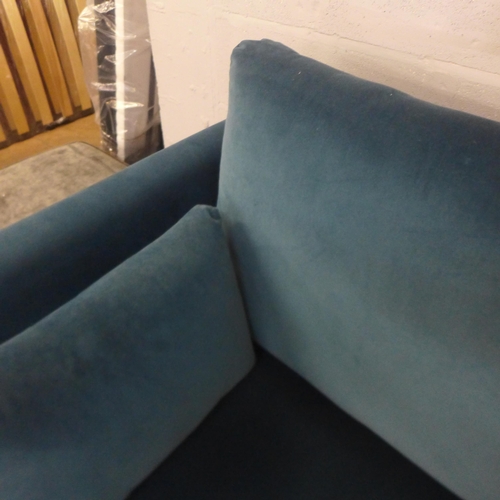 1491 - An Alice blue velvet three seater sofa - damaged leg