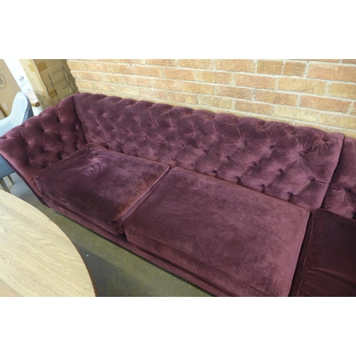 1503 - A burgundy buttoned velvet upholstered corner sofa