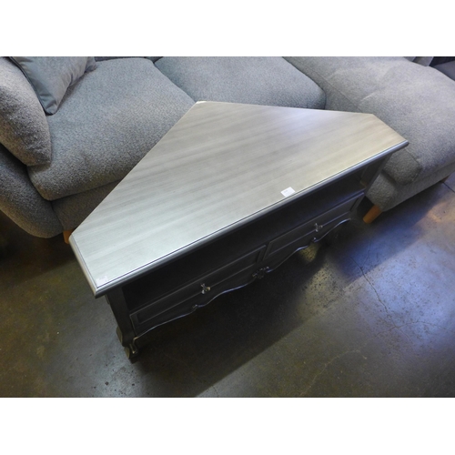 1525 - A silver corner media unit ( Damage to top and back panel )