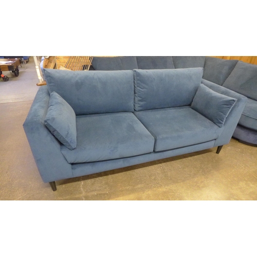 1526 - A dark blue velvet three seat sofa