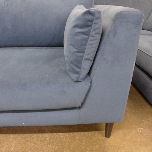 1526 - A dark blue velvet three seat sofa