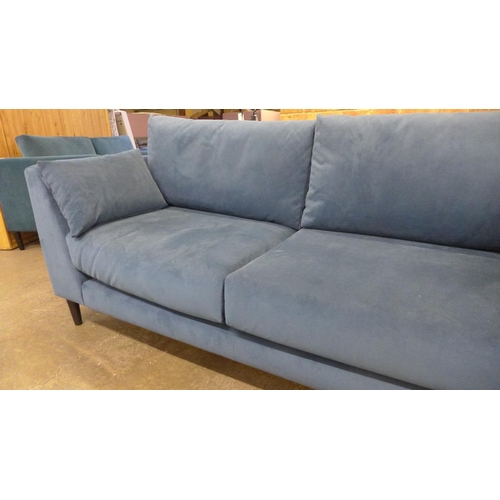 1526 - A dark blue velvet three seat sofa