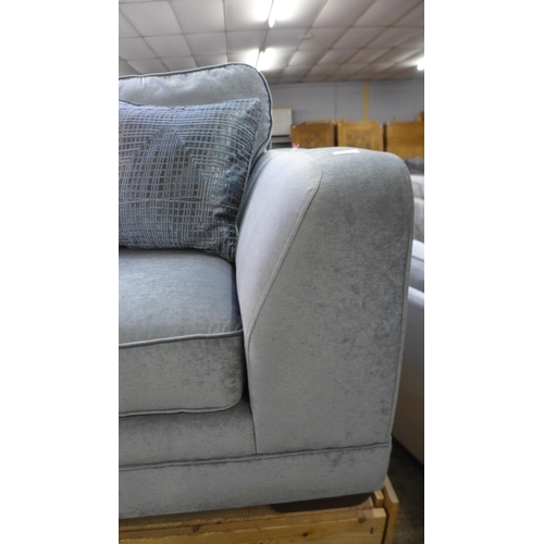 1384 - A Casey silver velvet three seater sofa