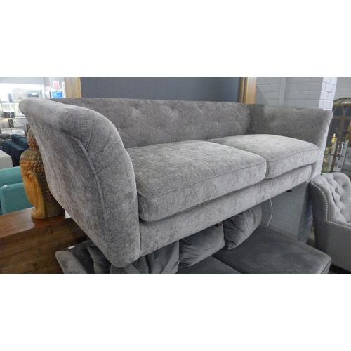 1532 - A grey button back fabric three seater sofa