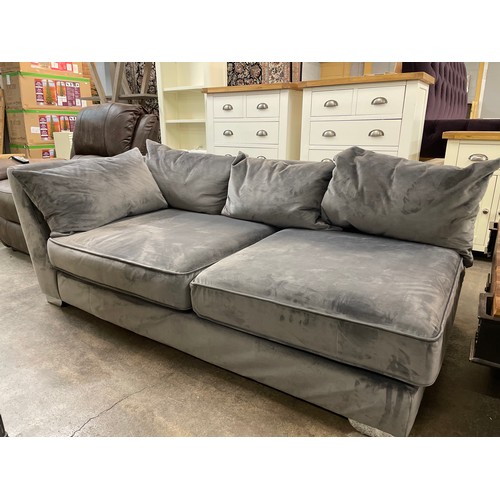 1533 - A designer grey velvet upholstered chaise/sofa