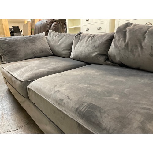 1533 - A designer grey velvet upholstered chaise/sofa