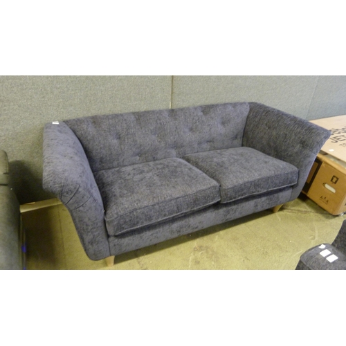 1539 - A Rebecca blue fabric button back three seater sofa