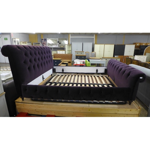 1543 - A burgundy button back superking bed frame (missing some frame parts)