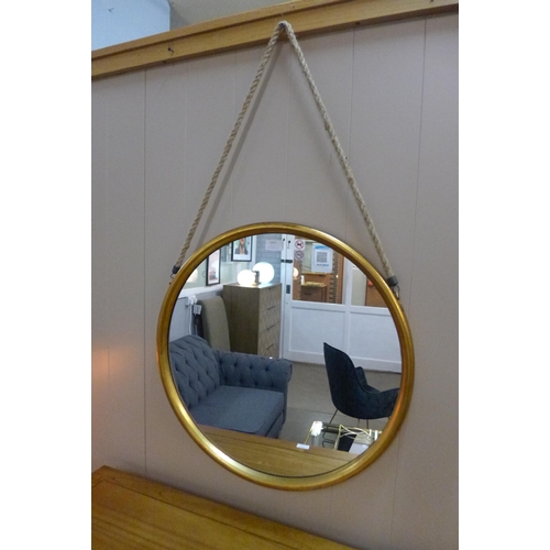 1414 - A large round gold metal mirror on a hanging rope  H58cms  (JRG1116)          #