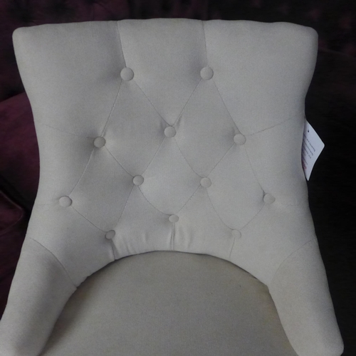 1420 - A pair of cream upholstered button back dining chairs