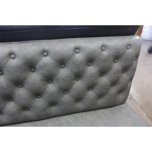 1594 - A grey leather effect button back bench *this lot is subject to VAT