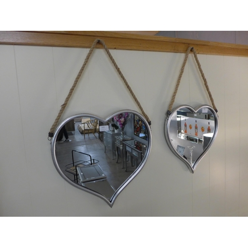 1457 - A set of two silver heart mirrors with rope hangers (1838917)   #