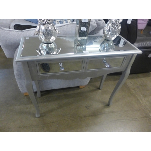 1458 - A silver mirrored two drawer console table (marked)