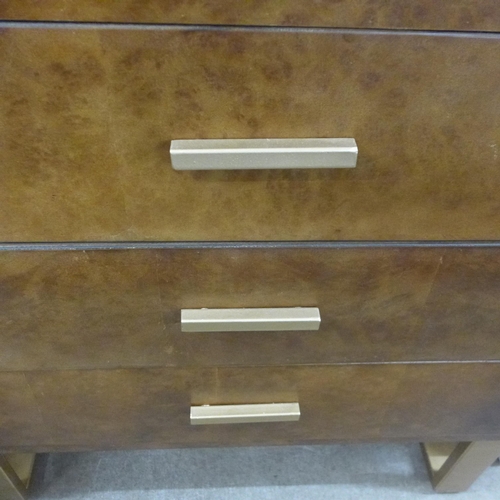 1471 - A rustic walnut veneer, leather effect three-drawer chest (marked)