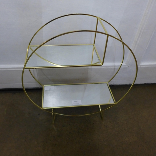 1473 - A gold circular display unit with bevelled mirror shelves (WF245310)   #