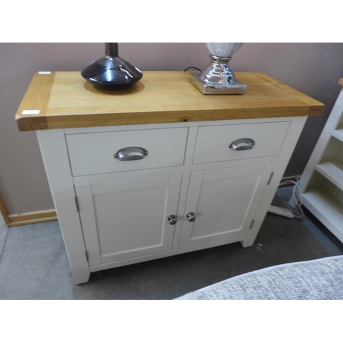 1368 - A Hampshire cream painted and oak standard sideboard *This lot is subject to VAT