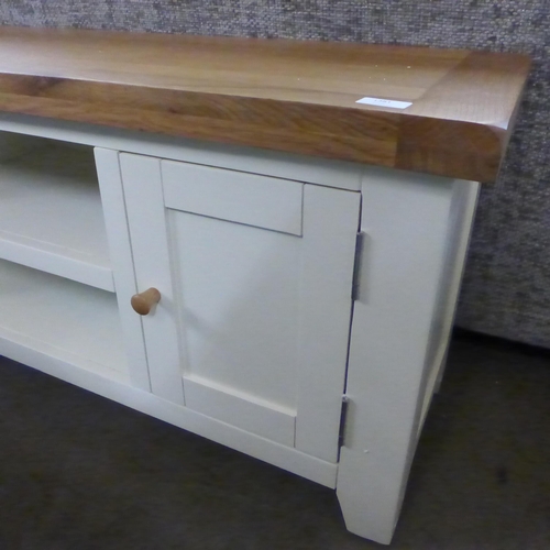 1381 - A Hampshire cream painted and oak TV unit *This lot is subject to VAT