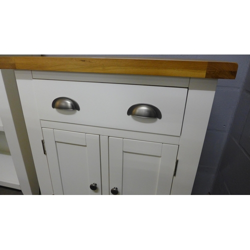 1402 - A Hampshire white painted and oak small sideboard *This lot is subject to VAT