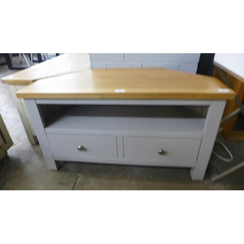 1437 - A Salisbury grey painted and oak corner TV unit (cracked frame) *This lot is subject to VAT