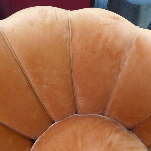 1499 - An ochre velvet shell armchair *This lot is subject to VAT