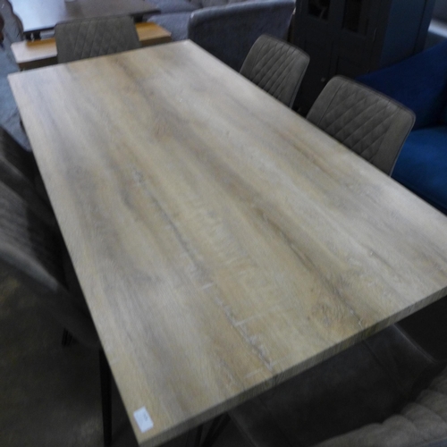 1528 - A Kamala 1.8m washed oak dining table with a set of six Finnick light grey chairs