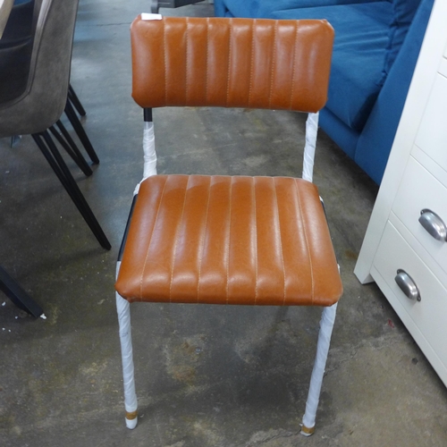 1537 - A pair of tan side chairs