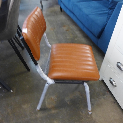 1537 - A pair of tan side chairs