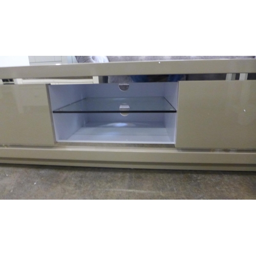 1545 - A mocha high gloss TV unit *This lot is subject to VAT