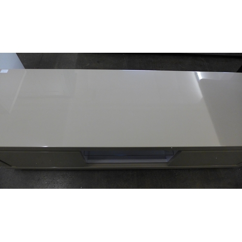 1545 - A mocha high gloss TV unit *This lot is subject to VAT