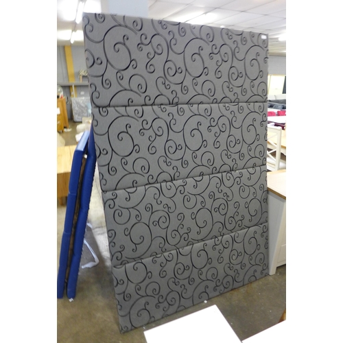 1552 - A large grey patterned headboard